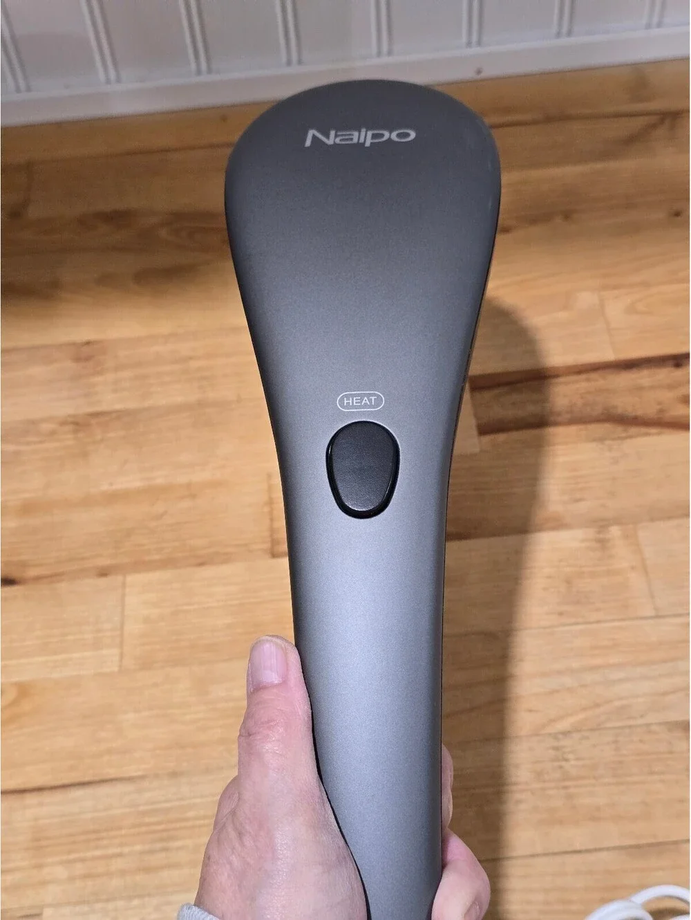 Naipo Handheld Massager w/ Heat & variable speed for a relaxing Massage